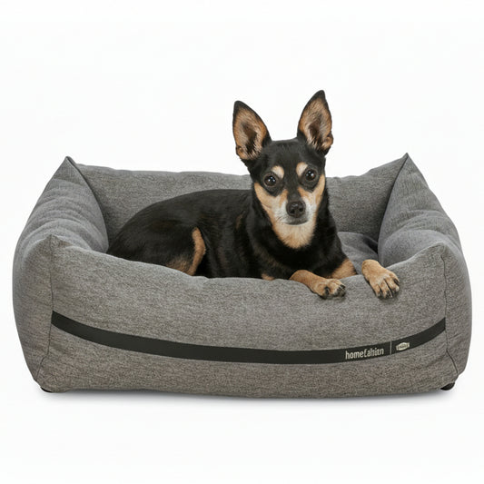 Hund som ligger i Trixie CityStyle hundbädd i grått – visning av storlek och komfort